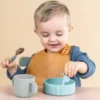 Done by deer - Peekaboo silikoninen ruokalappu 2-PACK - Elphee Mustard